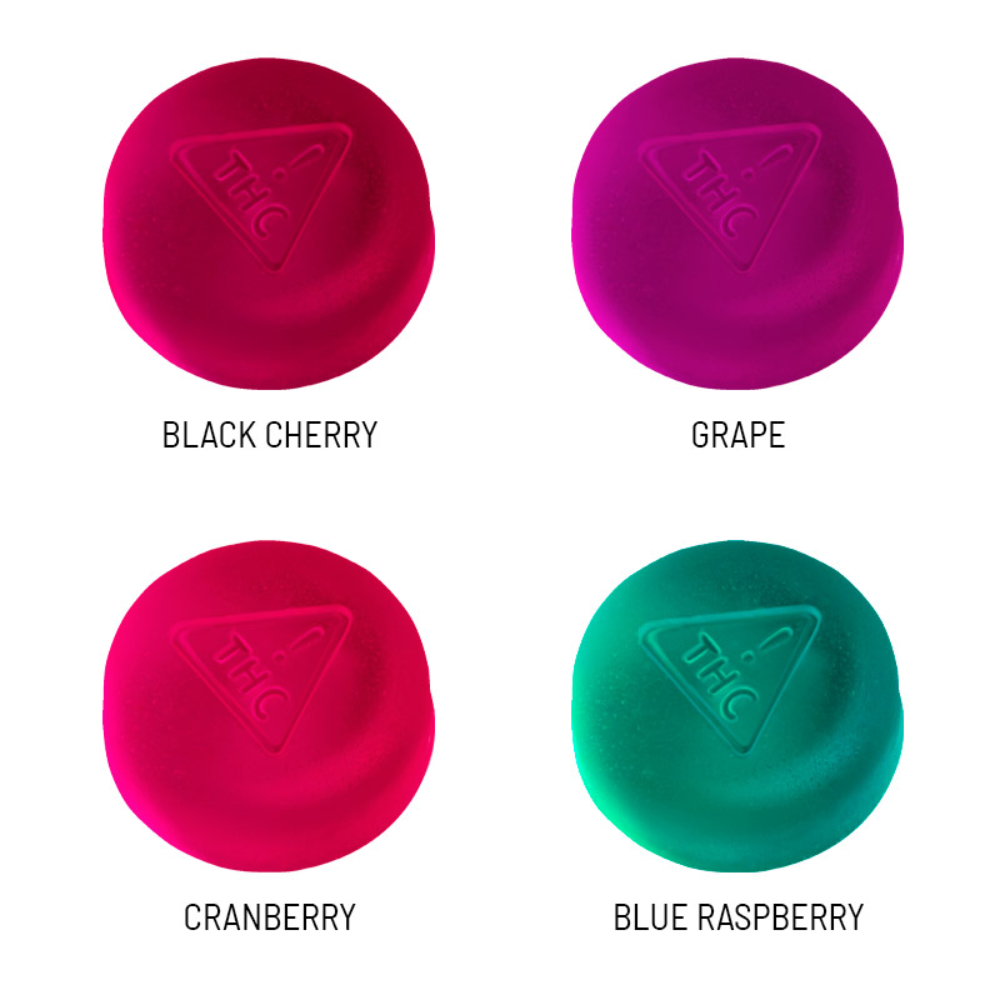 Close-up of four Jelly Bites gummies—Black Cherry, Grape, Cranberry and Blue Raspberry—each labeled and displayed on a white background