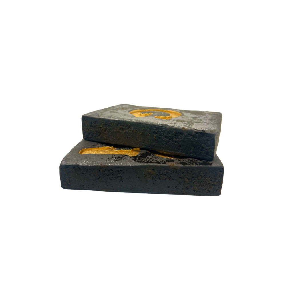 An image of two pieces of GMO cookies hash bricks on a white background