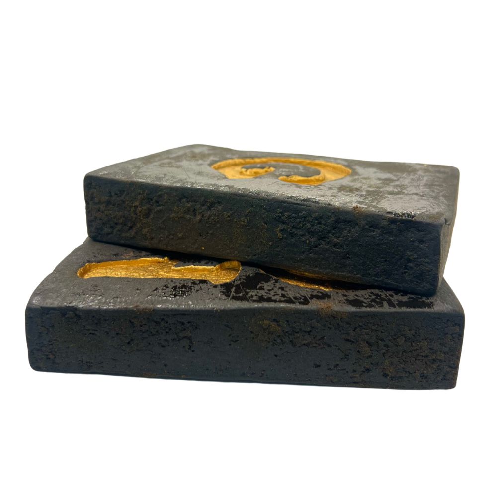 An image of two pieces of GMO Cookies Hash bricks on a white background