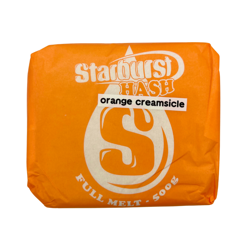 An image of Orange Creamsicle Full Melt Hash with an orange Starburst Wrapper on a white background