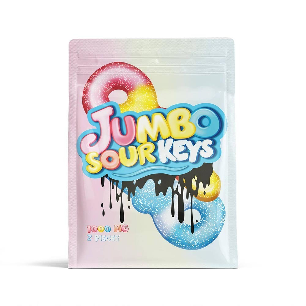 Colourful bag of Jumbo Sour Keys 1000mg THC edibles showing two large, sugar-coated candy keys with bright pastel packaging